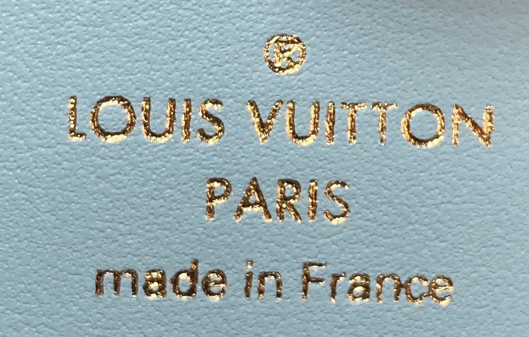 LV Vertical Wallet Taurillion Leather Compact