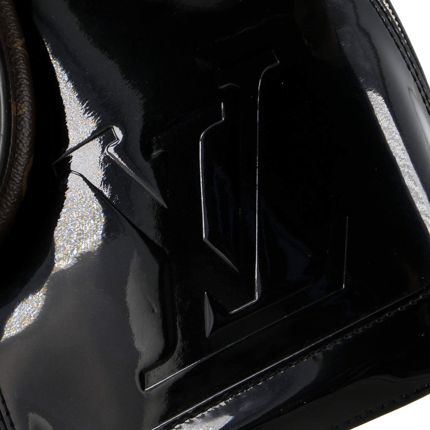 Alma Handbag Vernis with Monogram Canvas PM