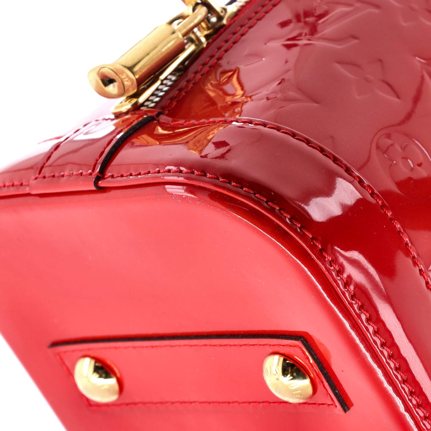 Alma Handbag Monogram Vernis PM