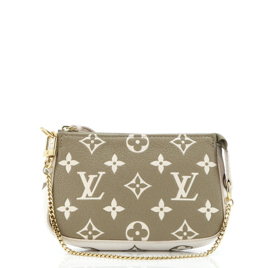 Pochette Accessoires Spring in the City Monogram Empreinte Leather Mini